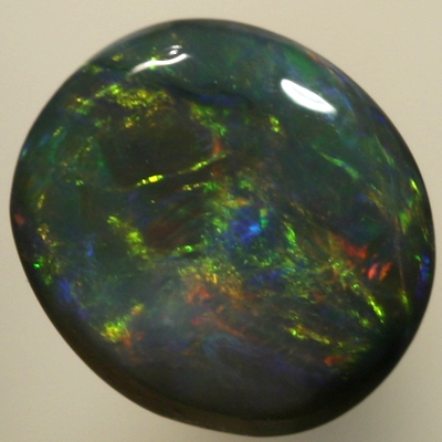 SOLID BLACK OPAL Bright flashes of green and orange